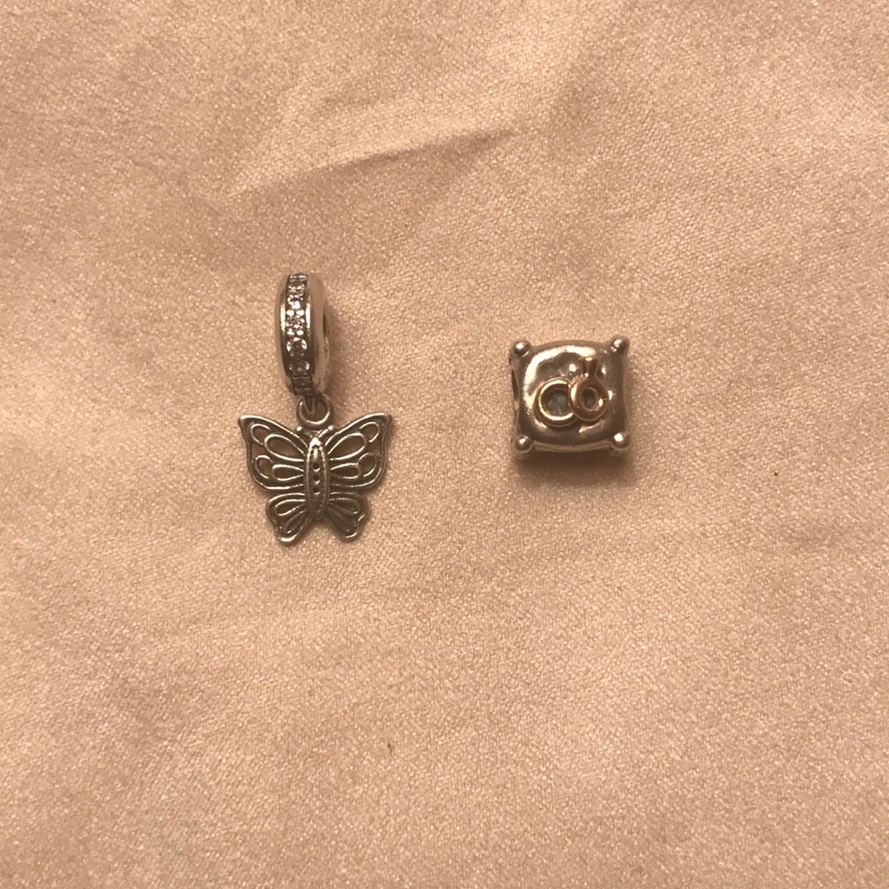 A butterfly and ring set pandora charms